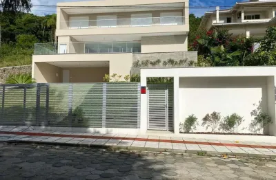 Casa à venda, 6 quartos sendo 5 suítes, 2 vagas, piscina, 600m² privativos, praia brava, florianópolis - sc