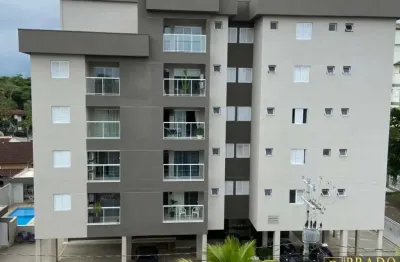 Apartamento com 70m², 2 dormitórios (1 suíte), 2 vagas de garagem, varanda gourmet e piscina.