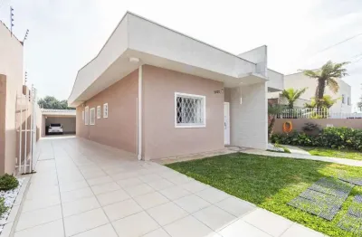 Oportunidade de ampla residência térrea com 3 suítes, escritório e espaço gourmet no portão