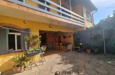 Casa em condomínio fechado com 4 quartos à venda na rua bernardino caetano fraga, 511, medianeira, porto alegre por r$ 660.000