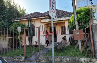 Casa com 3 quartos à venda na rua general gomes carneiro, 316, medianeira, porto alegre por r$ 550.000