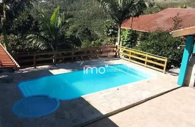 Vende casa de campo com vista espetacular no champs prive , 2 suítes ,piscina, edícula, área gourmet  1400m² a.t  300m² a.c - não aceita financiamento