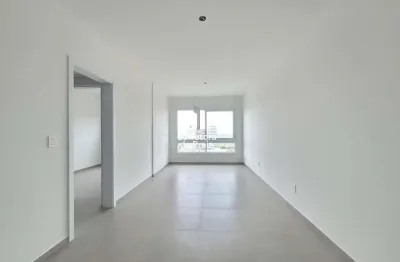 Apartamento para venda em tramandaí, centro, 2 dormitórios, 1 suíte, 2 banheiros, 1 vaga