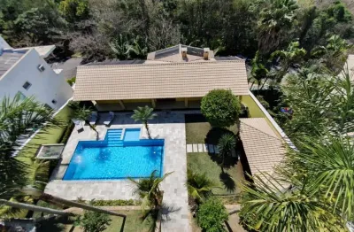 Condomínio Arujá Venda ou locação  04 dormitórios ( 03 suítes ) 03 salas ar condicionado