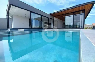 Casa com 4 dormitórios à venda, 600 m² por r$ 6.450.000,00 - condomínio reserva do paratehy - são josé dos campos/sp