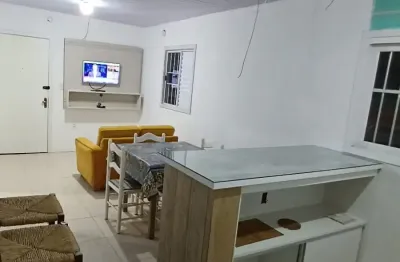 Casa com 2 quartos para alugar na Rua Andira, 134, Arco Íris, Capão da Canoa