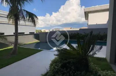 Mansão de luxo no supremo italia, projeto assinado pela ilana santiago, acabamento todo no porto belo, 4 suítes sendo uma master com closet e sacada com vista pra piscina, com elevador. codigo: 106929