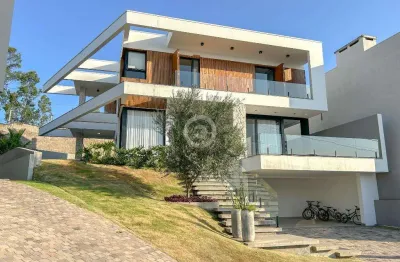 Casa à venda em estância velha, encosta do sol, com 3 suítes, com 336 m², horizon clube residencial