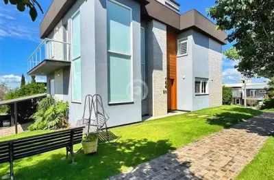 Casa à venda em estância velha, encosta do sol, com 3 suítes, com 235 m², horizon clube residencial