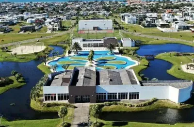 Terreno em condomínio fechado à venda na rua honorio germanno, 2009, condomínio dubai resort, capão da canoa, 356 m2 por r$ 430.000