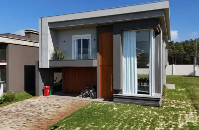 Casa em condomínio fechado com 4 quartos à venda na avenida paraguassu, 1570, capão novo, capão da canoa, 250 m2 por r$ 2.490.000