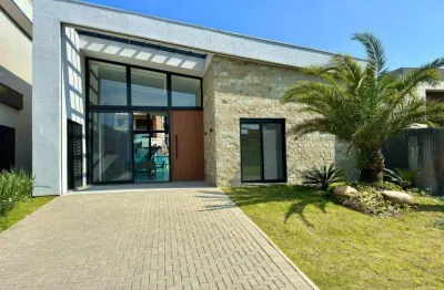 Casa em condomínio fechado com 4 quartos à venda na rua rio camisas, 101, xangri-lá, capão da canoa, 168 m2 por r$ 1.900.000