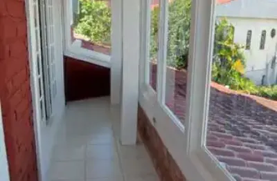 Casa com 3 quartos à venda na rua ângelo passuelo, 190, vila nova, porto alegre, 310 m2 por r$ 430.000