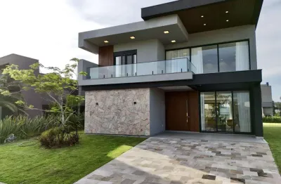 Casa em condomínio fechado com 5 quartos à venda na avenida paraguassu, 19, marina, xangri-lá, 320 m2 por r$ 3.790.000