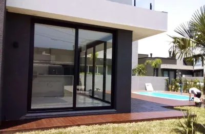 Casa em condomínio fechado com 4 quartos à venda na rua rio divisa, xangri-lá, capão da canoa por r$ 2.550.000