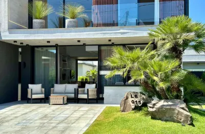 Casa em condomínio fechado com 4 quartos à venda na rua rio camisas, 101, remanso, xangri-lá, 200 m2 por r$ 2.450.000