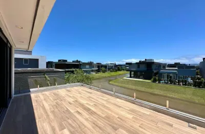 Casa em condomínio fechado com 4 quartos à venda na rua estrada do mar, km 33, parque antártica, capão da canoa, 322 m2 por r$ 3.800.000