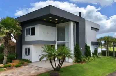 Casa em condomínio fechado com 5 quartos à venda na avenida central, 1100, xangri-lá, capão da canoa por r$ 2.700.000