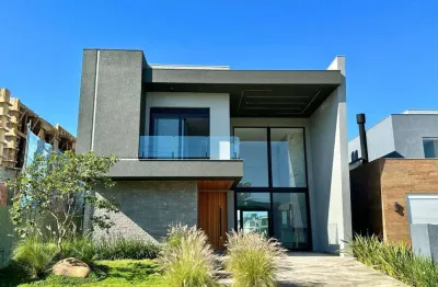 Casa em condomínio fechado com 4 quartos à venda na rua estrada do mar, km33, parque antártica, capão da canoa, 280 m2 por r$ 4.500.000