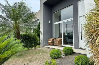Casa em condomínio fechado com 3 quartos à venda na rua -, zona norte, capão da canoa por r$ 1.399.000