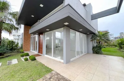 Casa com 3 quartos à venda na rua onório germano, 2009, araça, capão da canoa por r$ 1.450.000