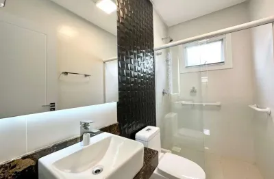 Casa em condomínio fechado com 4 quartos à venda na rua do amor perfeito, arco íris, capão da canoa, 186 m2 por r$ 1.490.000