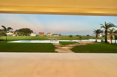 Casa em condomínio fechado com 5 quartos à venda na rua estrada do mar, centro, xangri-lá por r$ 4.900.000