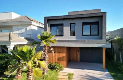 Casa em condomínio fechado com 4 quartos à venda na avenida paraguassu, 130, marina, xangri-lá por r$ 2.450.000