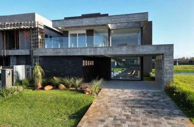 Casa em condomínio fechado com 4 quartos à venda na rua rio camisas, 101, centro, xangri-lá por r$ 2.890.000