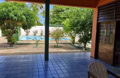 Casa duple com mais de 3 suítes e localizado na passos da praia de guaxuma.