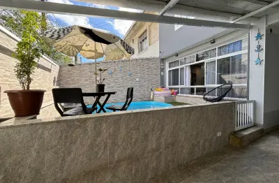 Sobrado amplo, com 04 dormitórios, piscina , à venda, na ponta da praia.