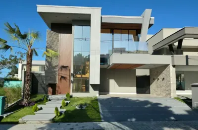 Casa duplex de alto padrão no cidade alpha com 274m² piscina e deck privativos além de 4 amplas suítes.