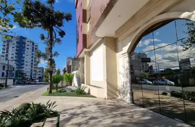 Amplo apartamento com 4 quartos e duas vagas de garagem individuais