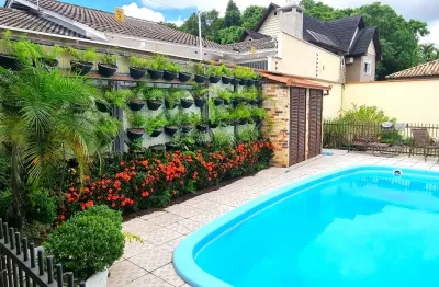 Sobrado com 5 quartos, sendo 4 suítes no residencial orleans