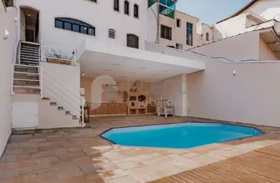 Sobrado à venda com 387 de área útil no jardim paraíso com área gourmet com piscina, forno e churra