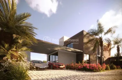 Casa térrea em condomínio com 3 suítes, sala dois ambientes, 5 banheiros e 2 vagas na garagem - unidade 12
