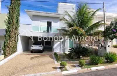 Bela casa em condomínio, com 3 suítes e piscina aquecida, por r$ 1.590.000,00