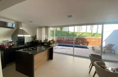 Casa charmosa com área gourmet e piscina próxima ao parque ecológico