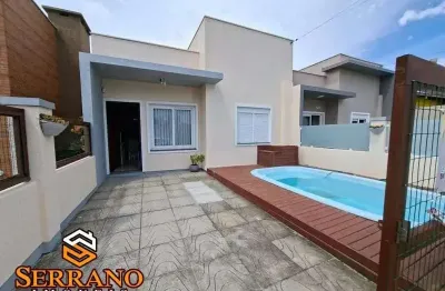Casa com poiscina e forro em laje de conreto, na praia de imbé!