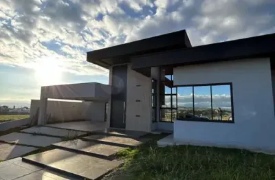 Casa térrea com 03 suítes no condomínios campos do conde taubaté