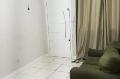 Apartamento no cdhu - laguna com 2 dormitórios e 1 vaga de garagem - quitado