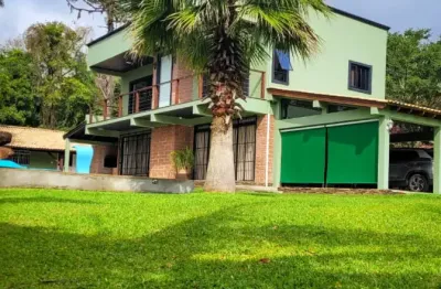 Paraíso na beira da lagoa com escritura.   asfalto na porta e total privacidade no litoral em maquiné.