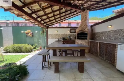 Casa em condomínio a 300 metros da praia de manguinhos, com 3 quartos e área gourmet.
