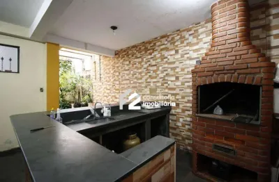 Sobrado com 3 dormitórios à venda, 323 m² por R$ 960.000,00 - Jardim Bela Vista - Santo André/SP