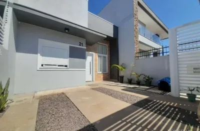 Casa com 3 quartos à venda na Rua Rubem Fonseca Vargas, 21, Dom Feliciano, Gravataí por R$ 450.000