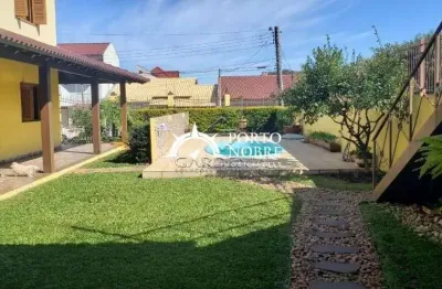 Casa com 5 dormitórios à venda, 509 m² por R$ 1.690.000,00 - Rubem Berta - Porto