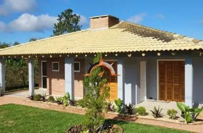 Casa com 3 dormitórios à venda, 250 m² por R$ 600.000,00 - Águas Claras - Viamão