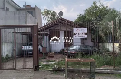 Excelente terreno 10x54 m com casa mista á venda na Protásio Alves