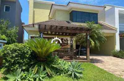 Casa com 4 dormitórios à venda, 300 m² por R$ 1.850.000 - Zona Nova - Capão da C