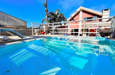 Casa com 4 dormitórios à venda, 300 m² por r$ 1.800.000,00 - centro - guaratuba/pr
